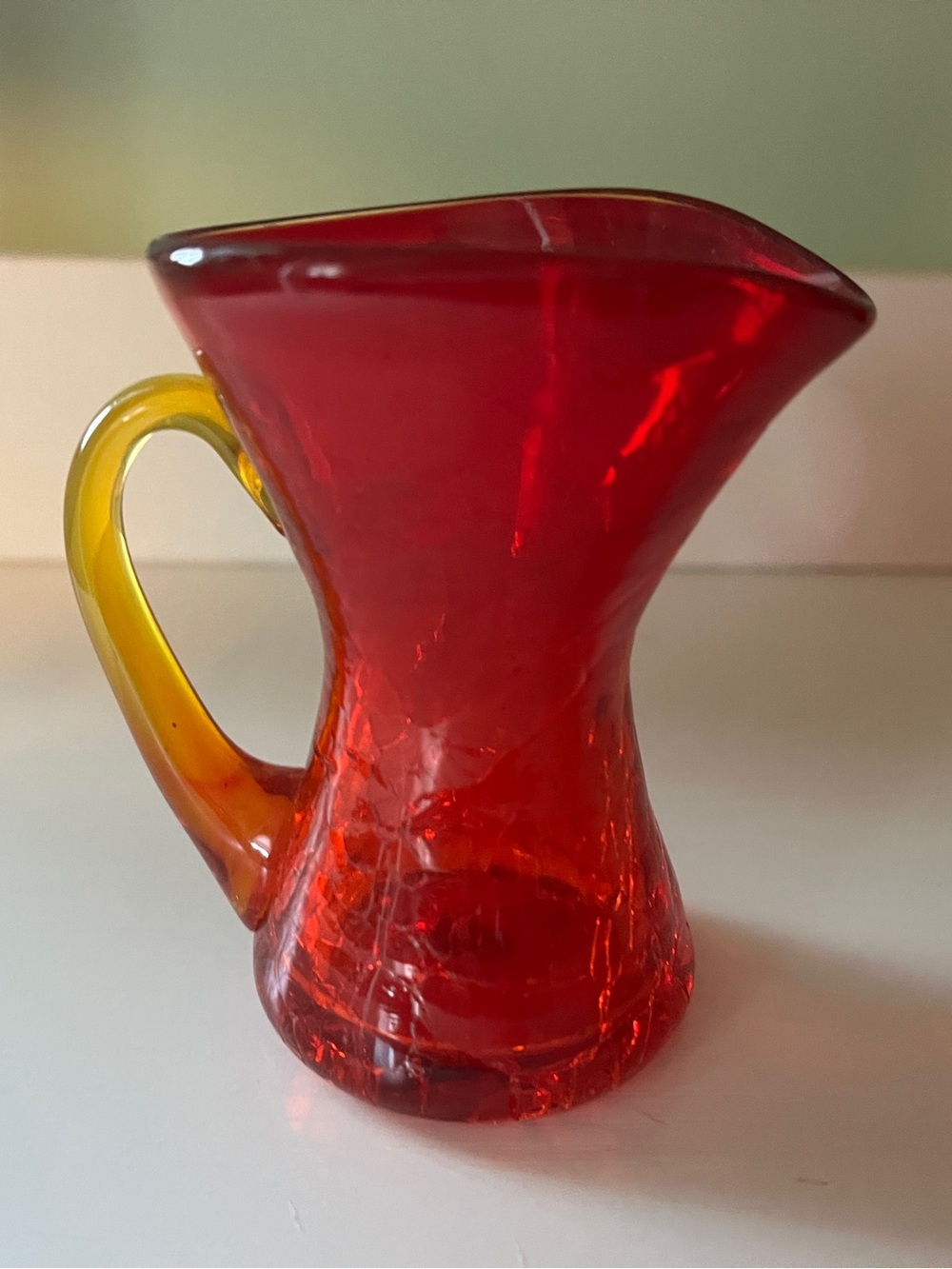 Red Glass Decorative Pitcher with Amber Handle